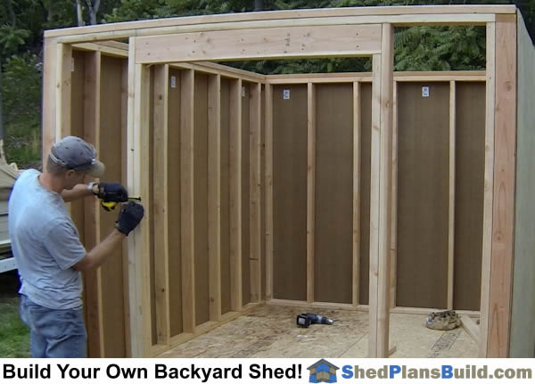 Installing siding on the shed walls